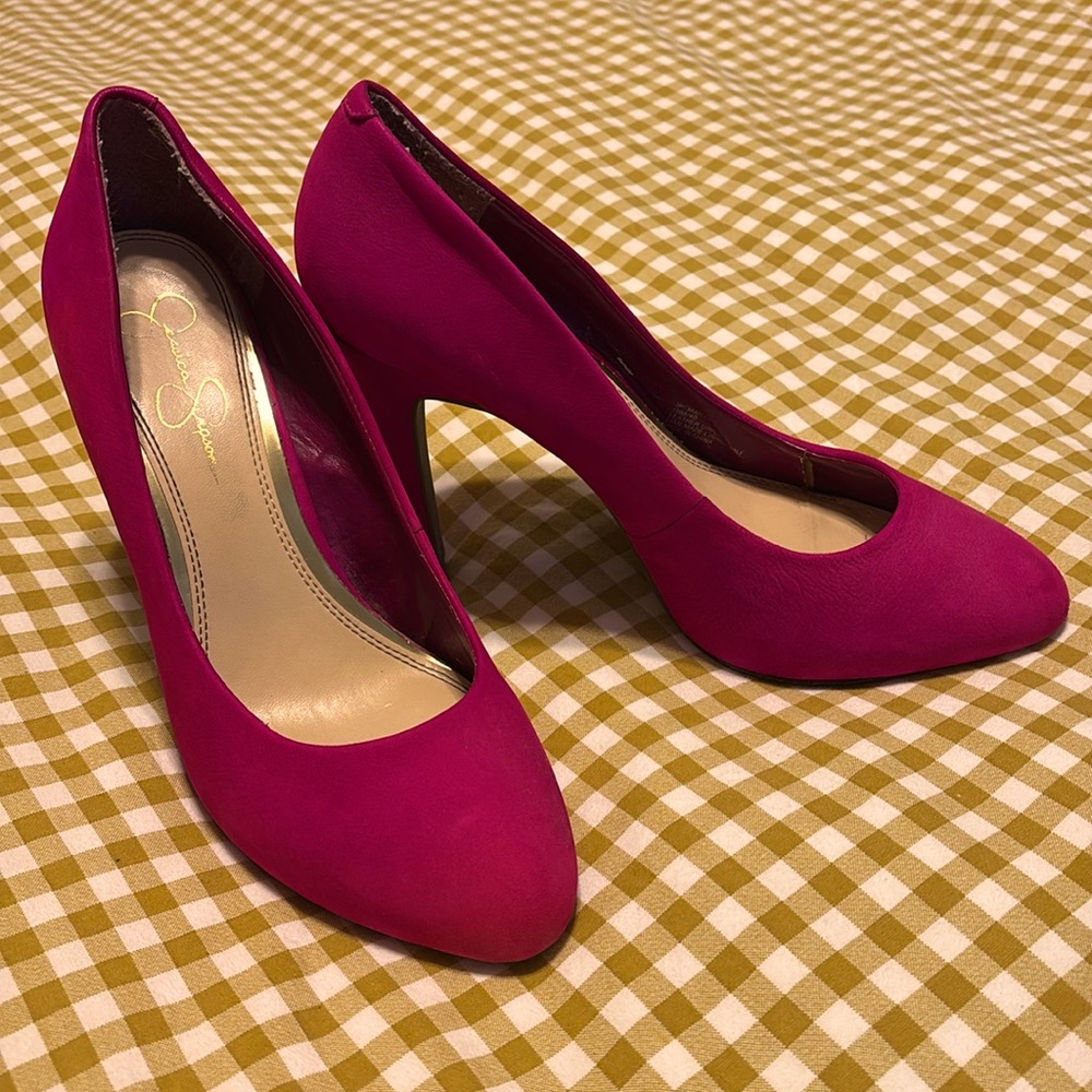 Bright pink leather pumps.